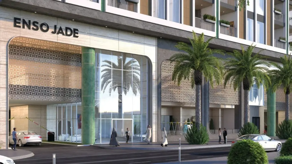 Entrance with palm trees and people walking