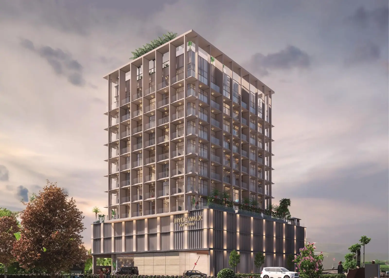 Tower with balconies and planted roof at dusk