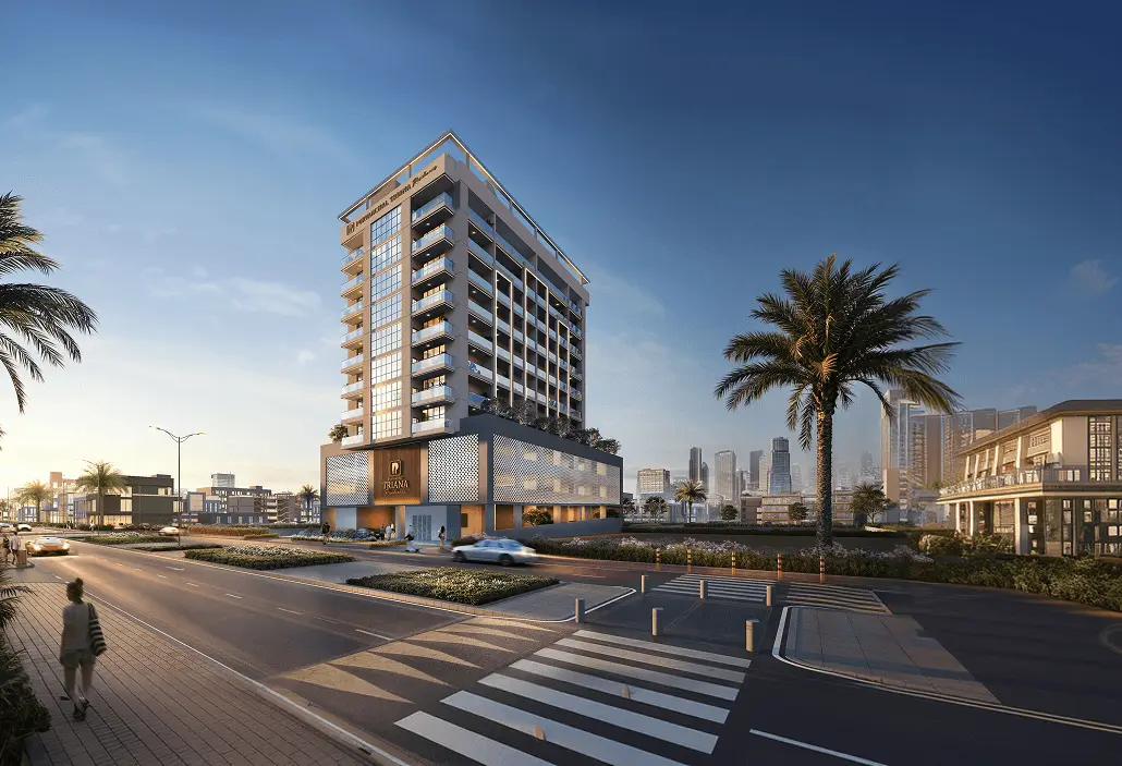 Mid-rise residential tower on a street corner at dusk
