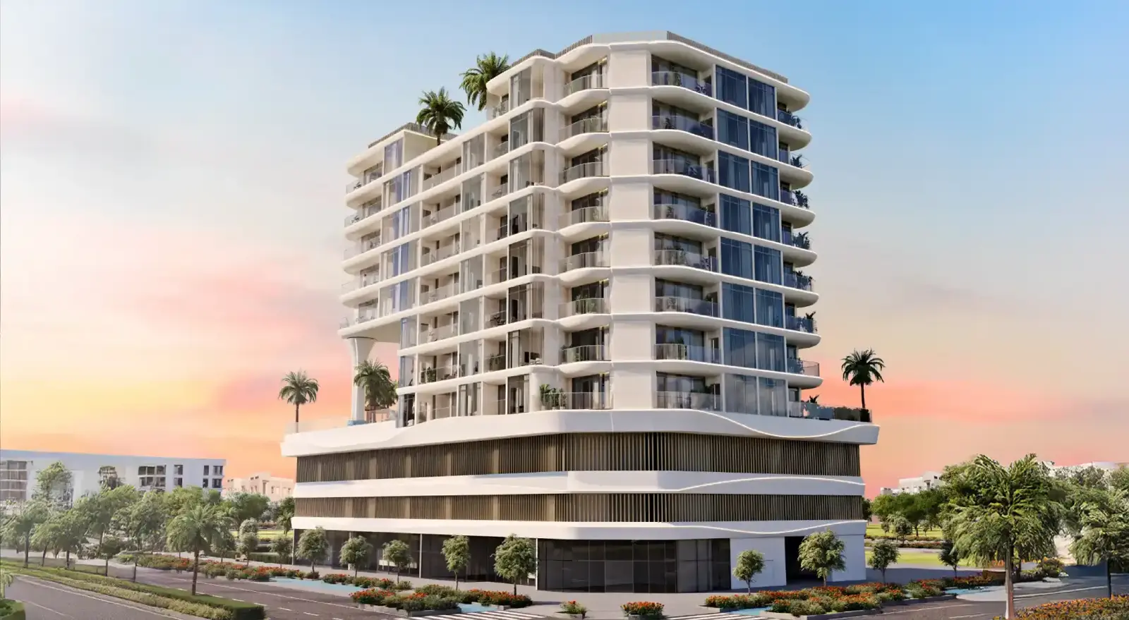 Building exterior at sunset with palm trees