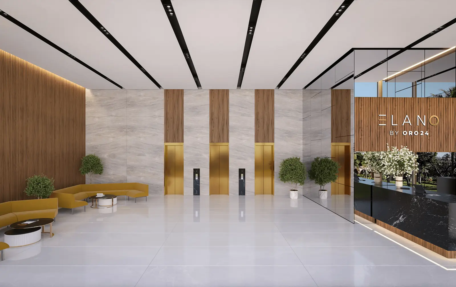 Entrance lobby with gold lifts and reception desk