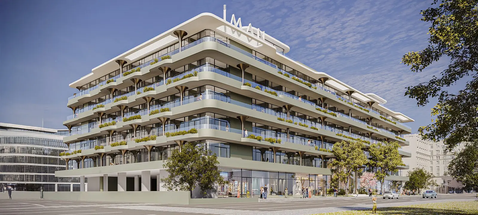 Corner view with terraces and IMAN sign on roof