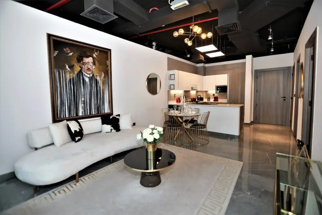 Furnished living room with sofa and artwork