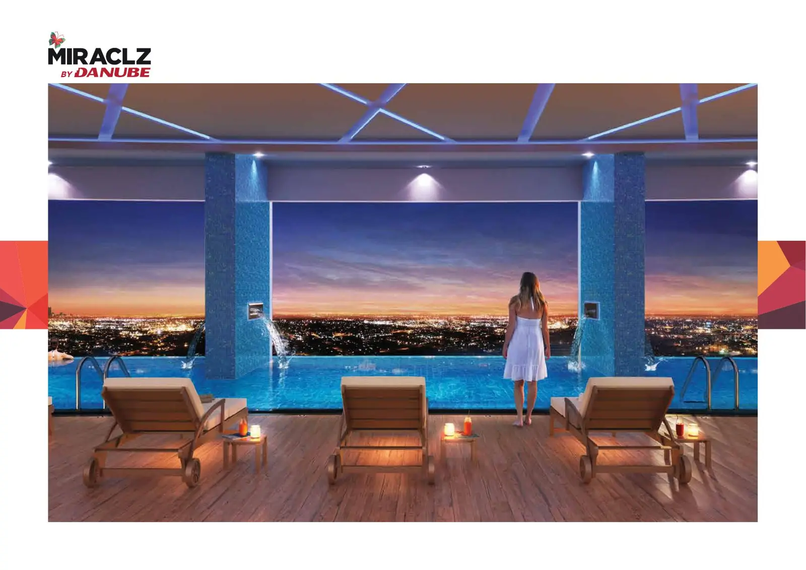 Infinity pool deck with city views at dusk