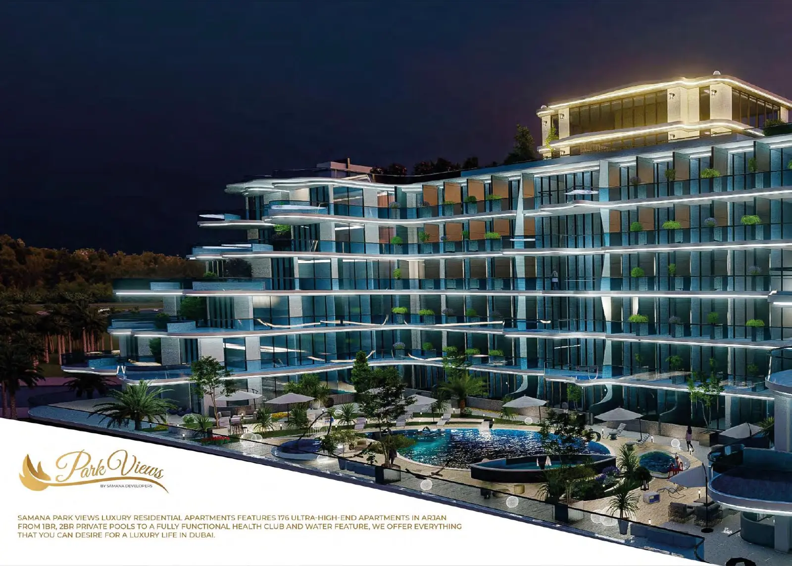 Building lit at night with pool deck