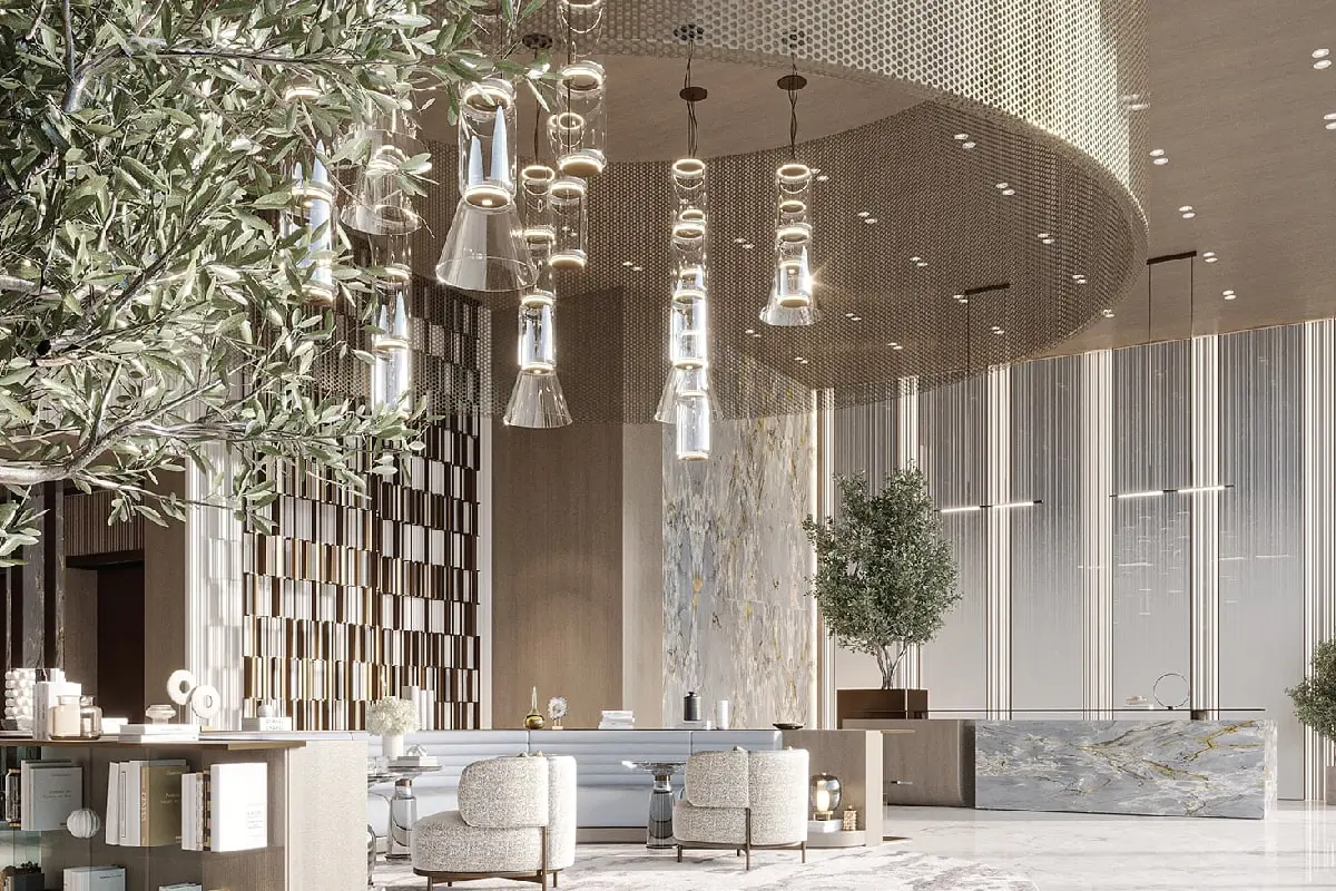 Tall lobby with reception desk and chandeliers