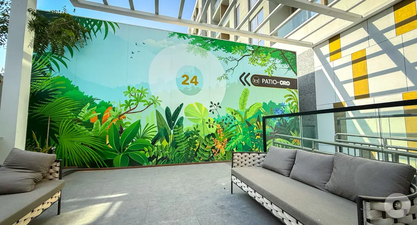Patio seating area with jungle wall mural