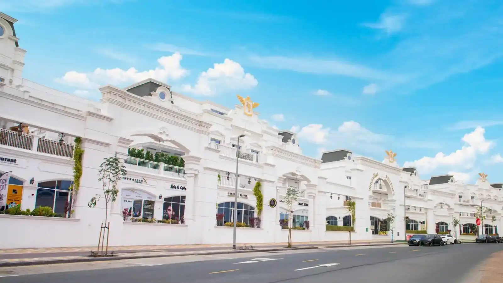 White building facade with arches in daylight