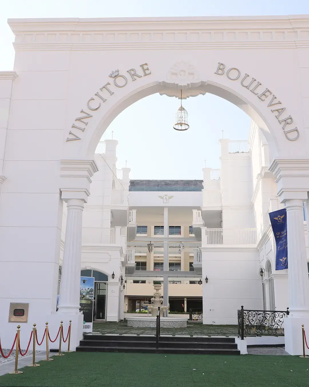 Entrance arch with Vincitore Boulevard lettering