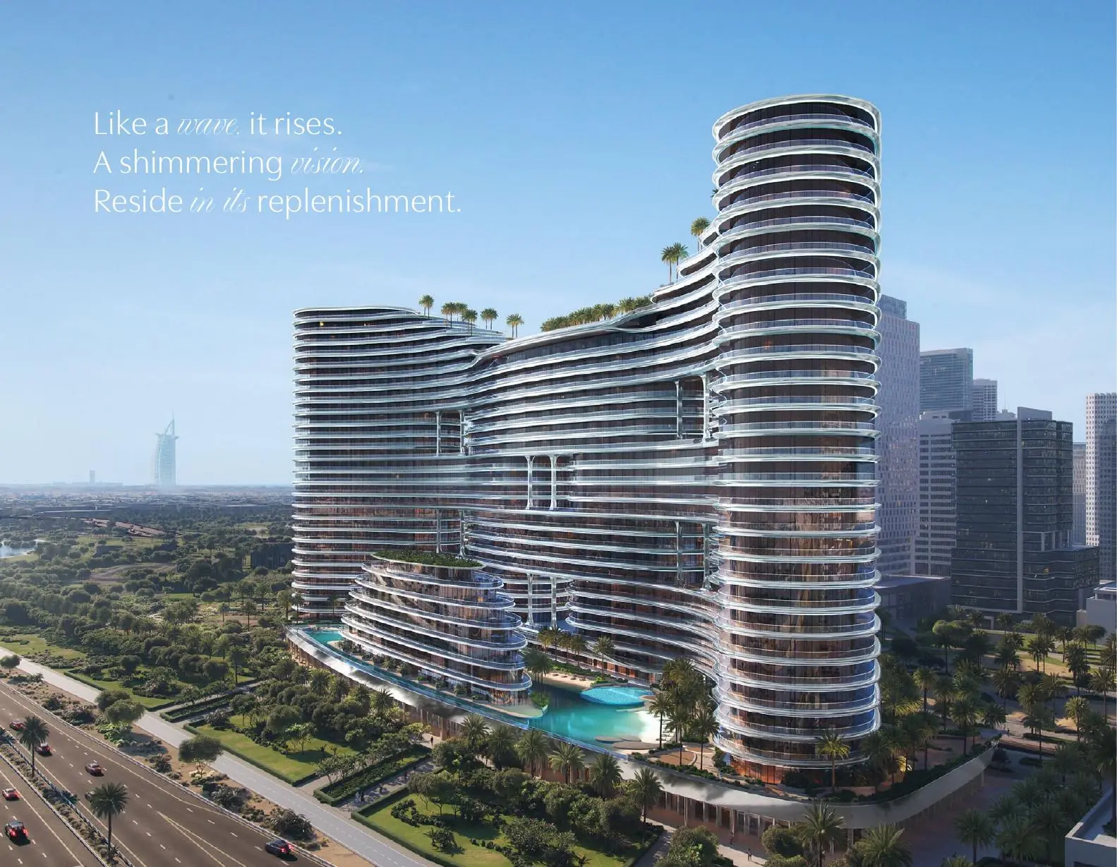 Tower rising above pool and park, aerial view