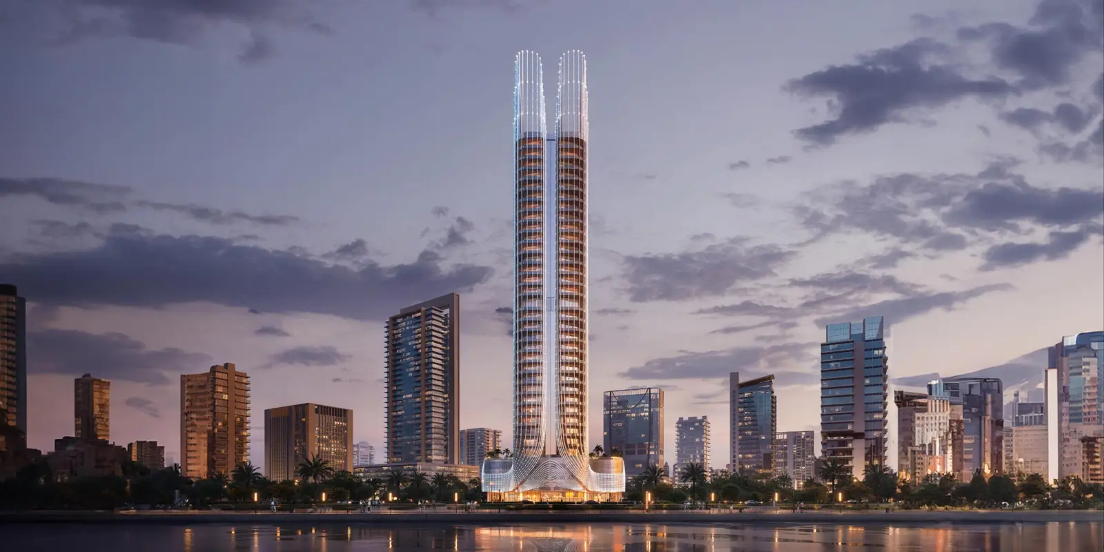 Tall tower at dusk beside the water