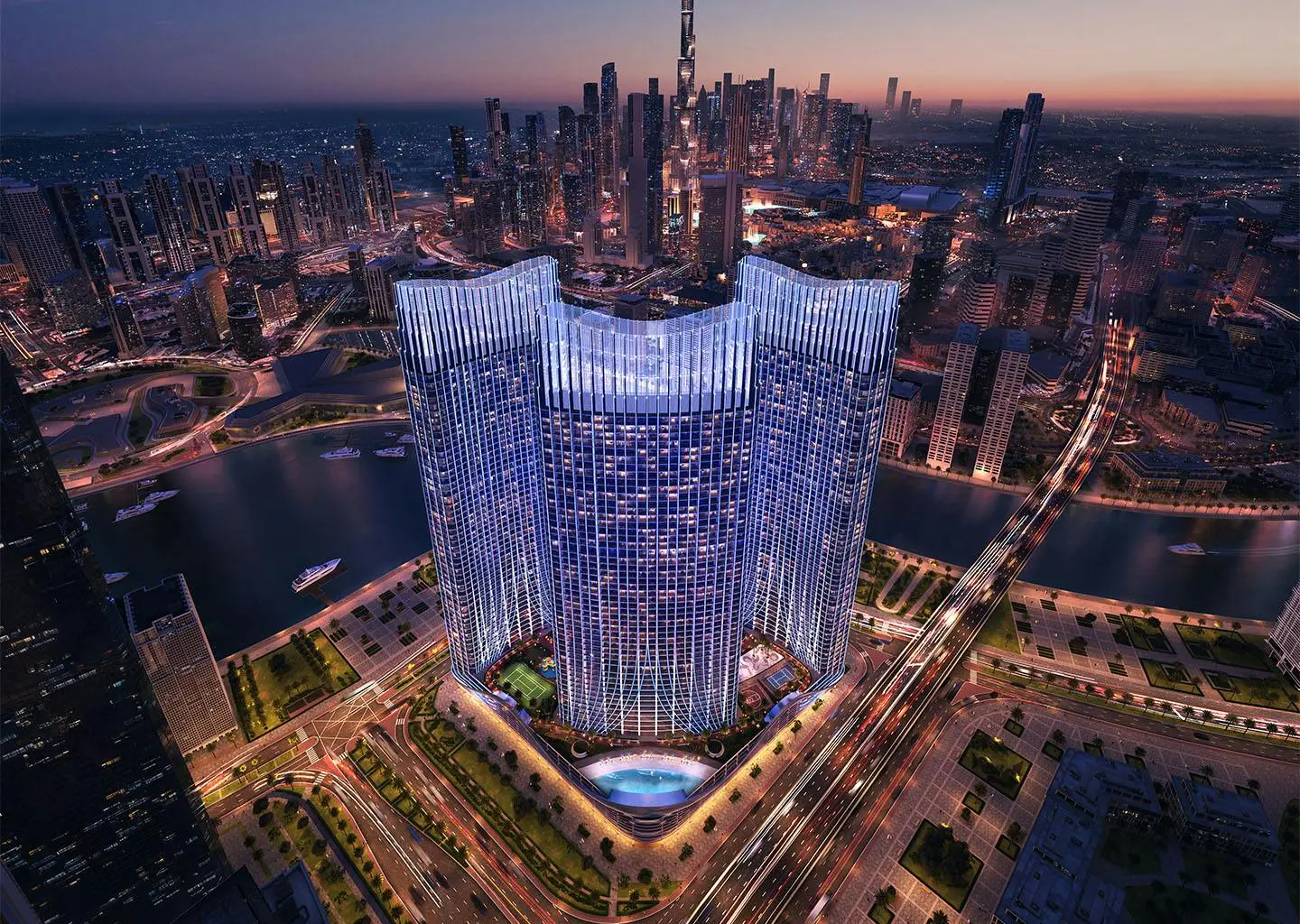 Towers at dusk above the Dubai skyline