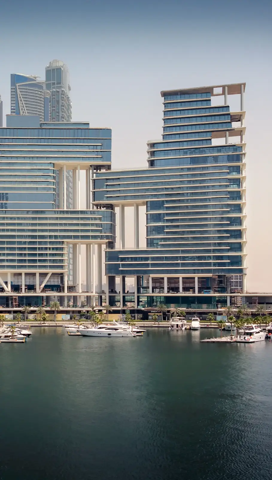 The two towers across the marina, vertical crop