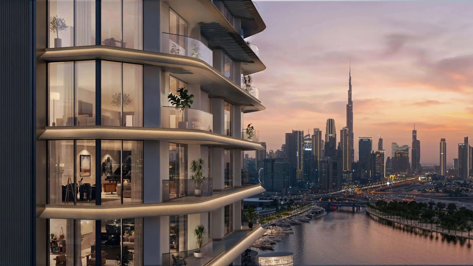 Curved balconies with Burj Khalifa skyline at sunset