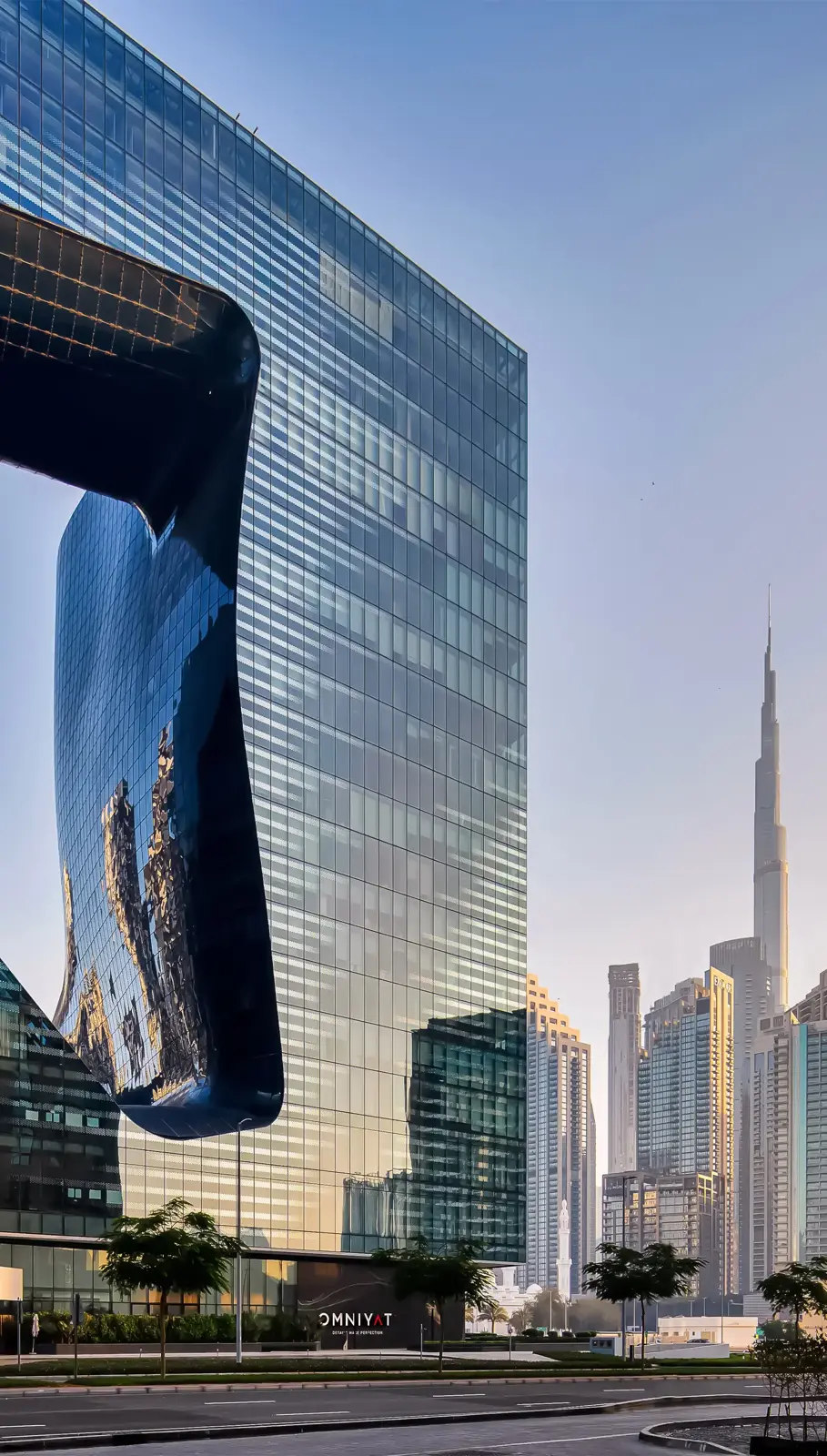 Street view of the facade and Burj Khalifa