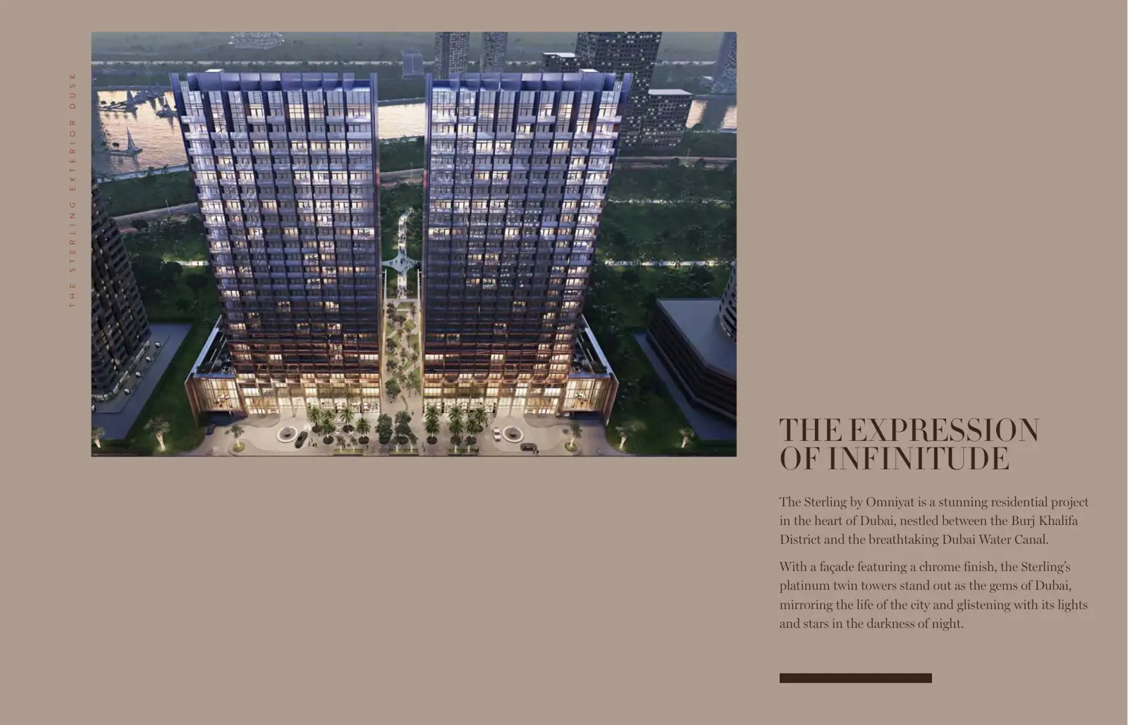 Twin towers at dusk with landscaped plaza