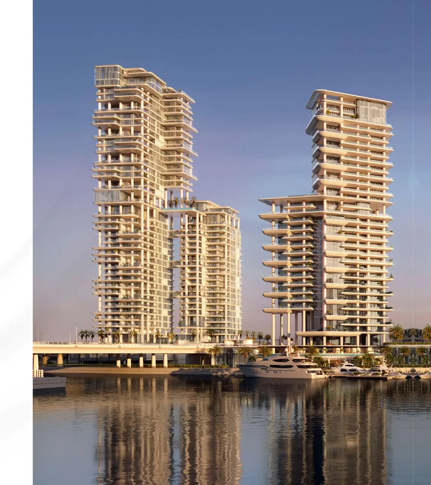 Both towers seen from the water at dusk