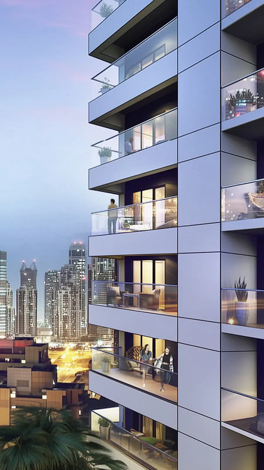 Tower balconies at dusk with city lights