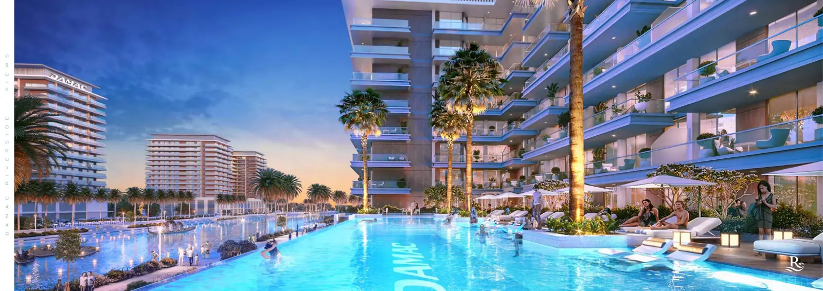 Apartment towers beside a pool at dusk