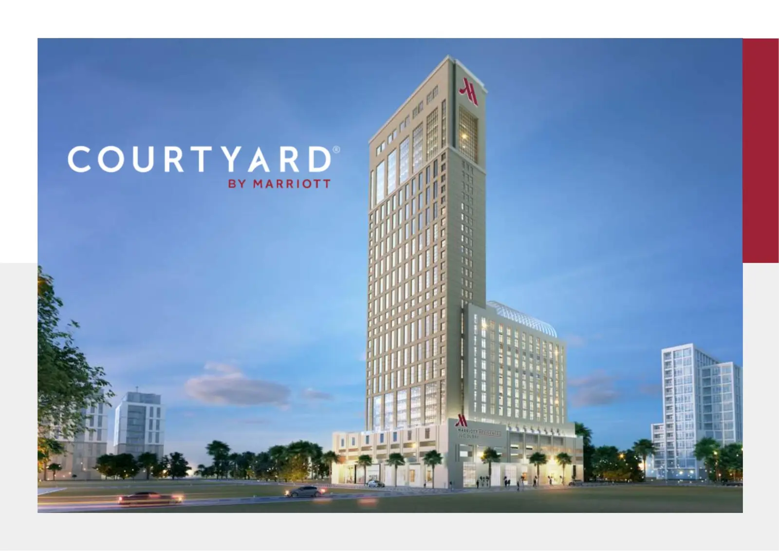 Tall hotel tower with podium at dusk