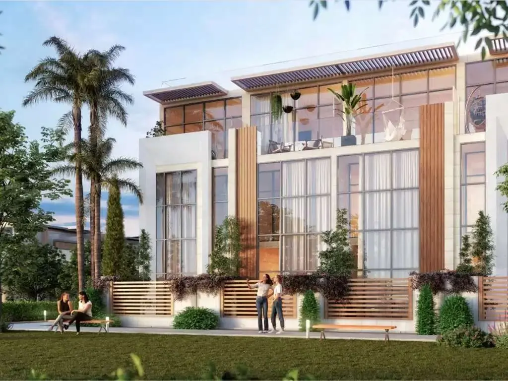 Townhouse facade with timber fins and roof terrace