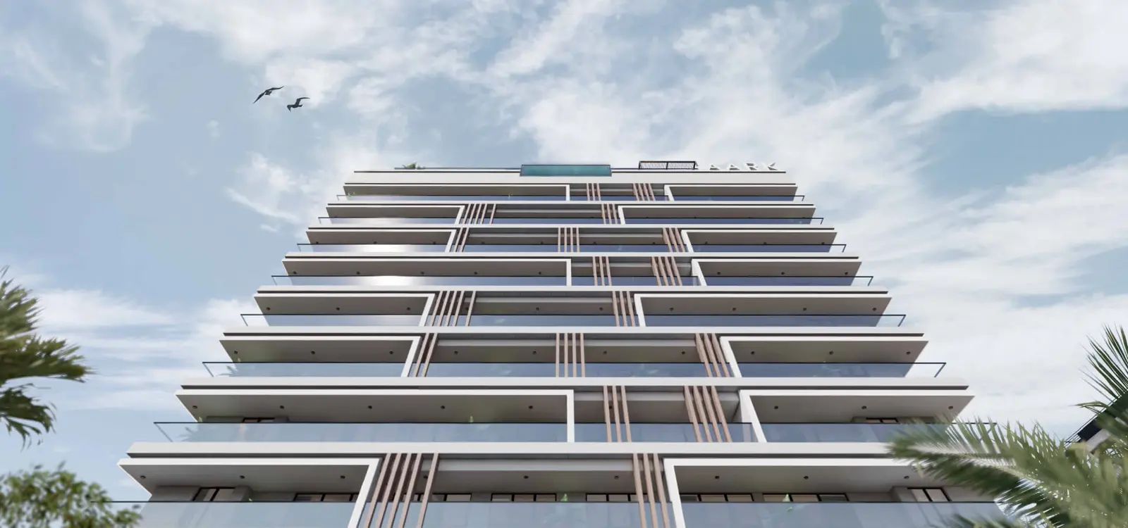 Tower facade seen from below with rooftop pool