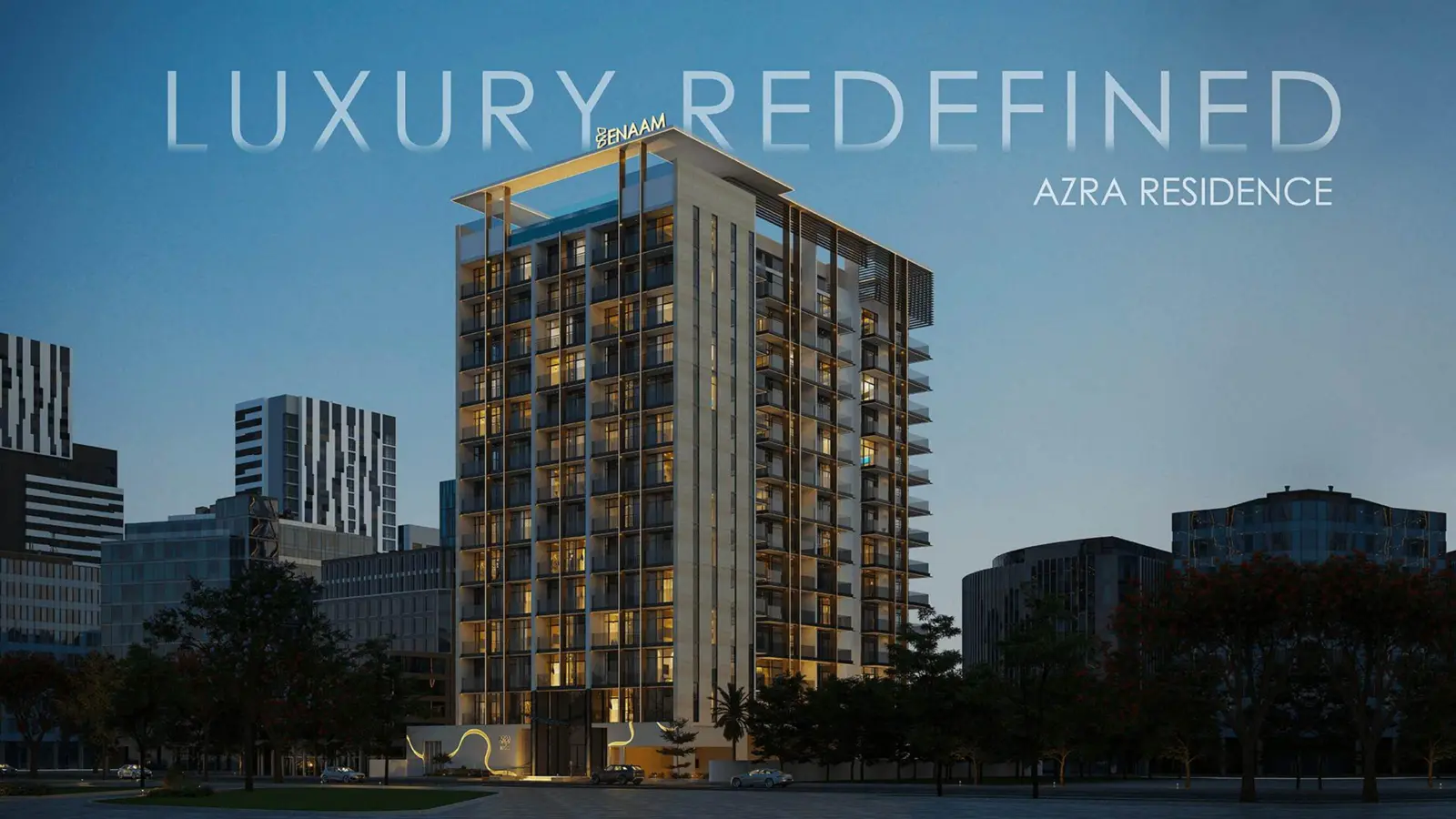 Evening view of the lit tower with rooftop pool