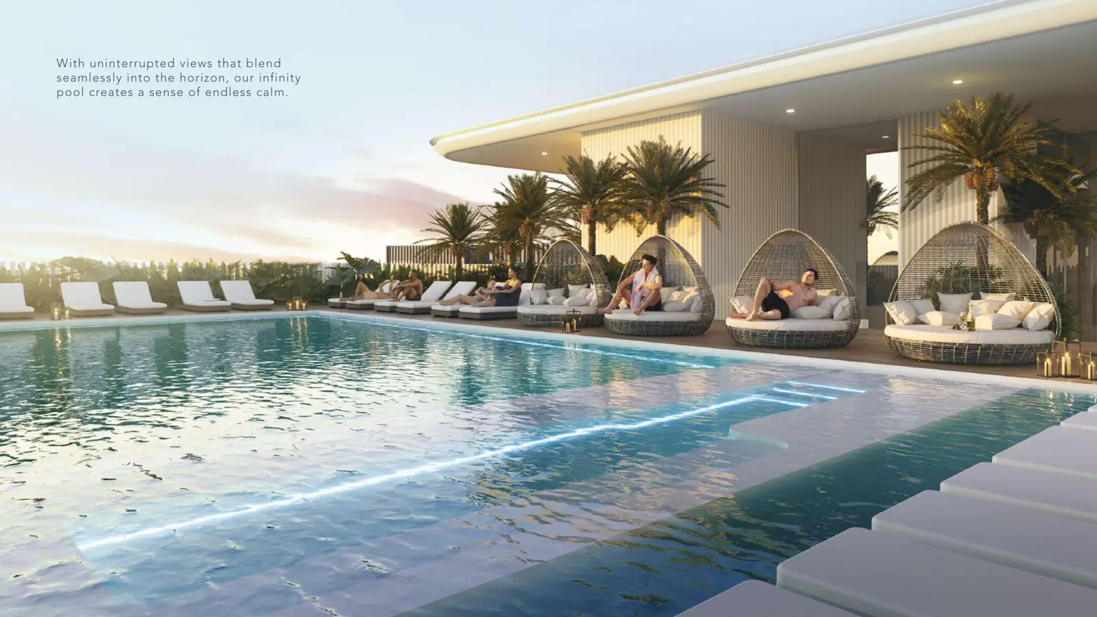 Rooftop infinity pool with cabanas at sunset