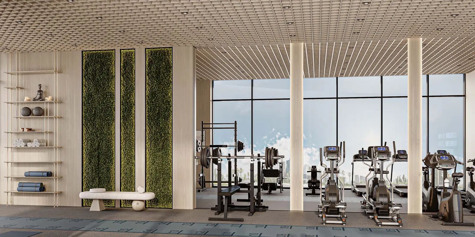 Gym with weights and cardio machines by tall windows