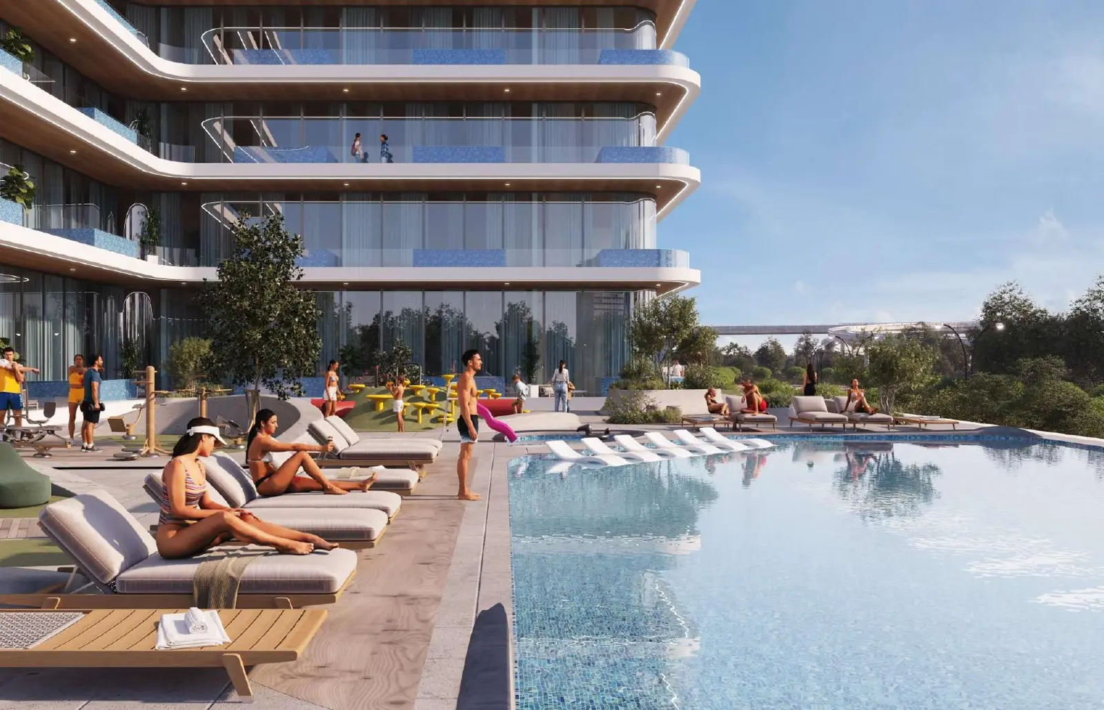 Pool deck with sunbeds below the stacked balconies