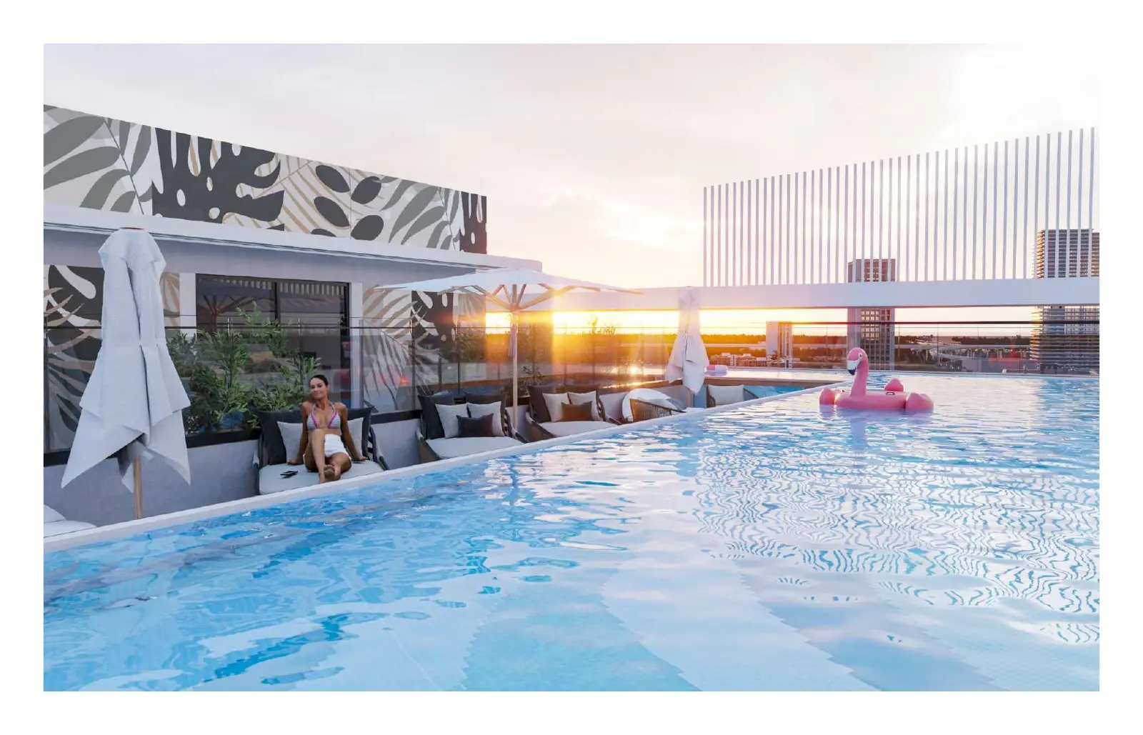 Rooftop pool at sunset with lounge seating