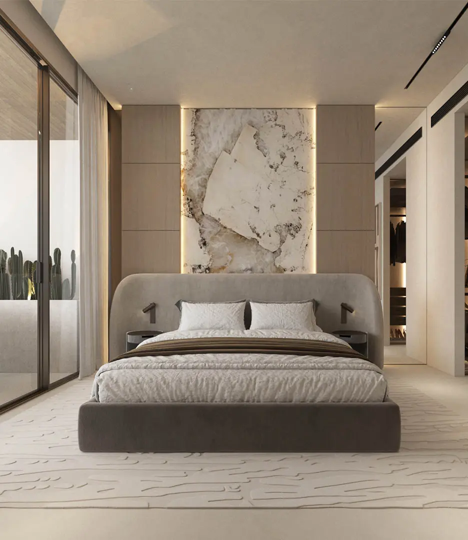 Bedroom with marble feature wall and walk-in wardrobe