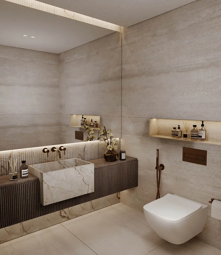 Bathroom with marble basin and brass fittings