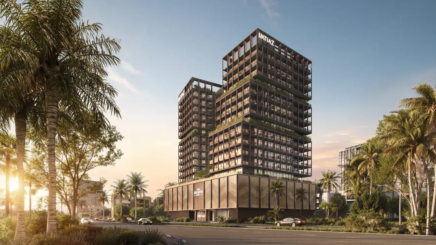 Two-volume tower with podium at sunset