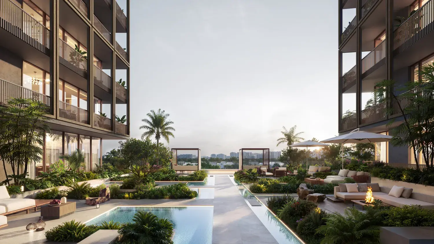 Pool deck with cabanas and fire pit between towers