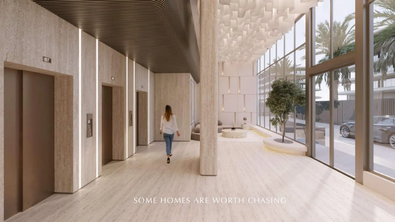 Lobby with lifts and tall glass wall