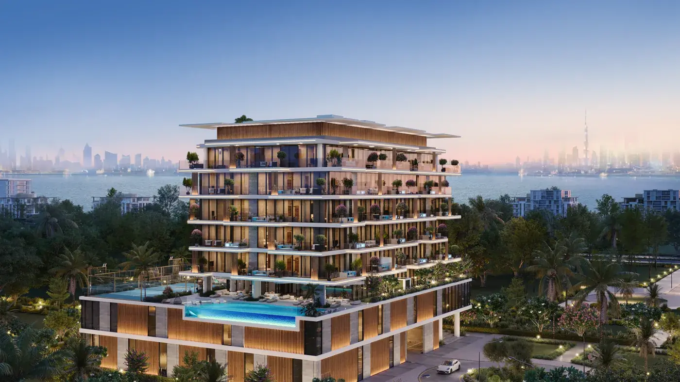 Low-rise tower with pool deck at dusk