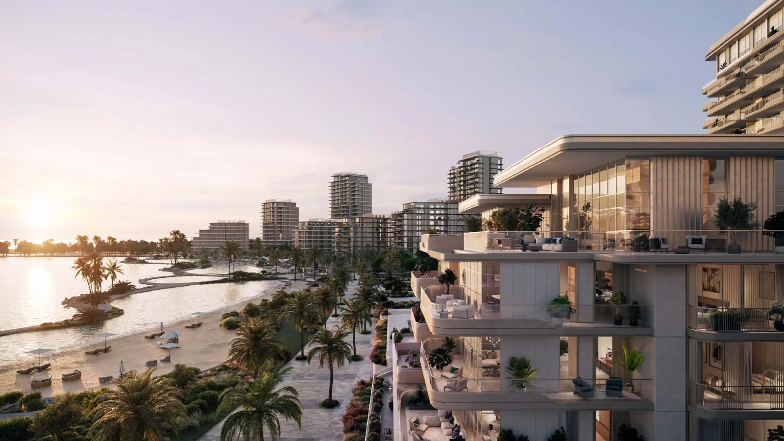 Terraced building facade along the beach at sunset