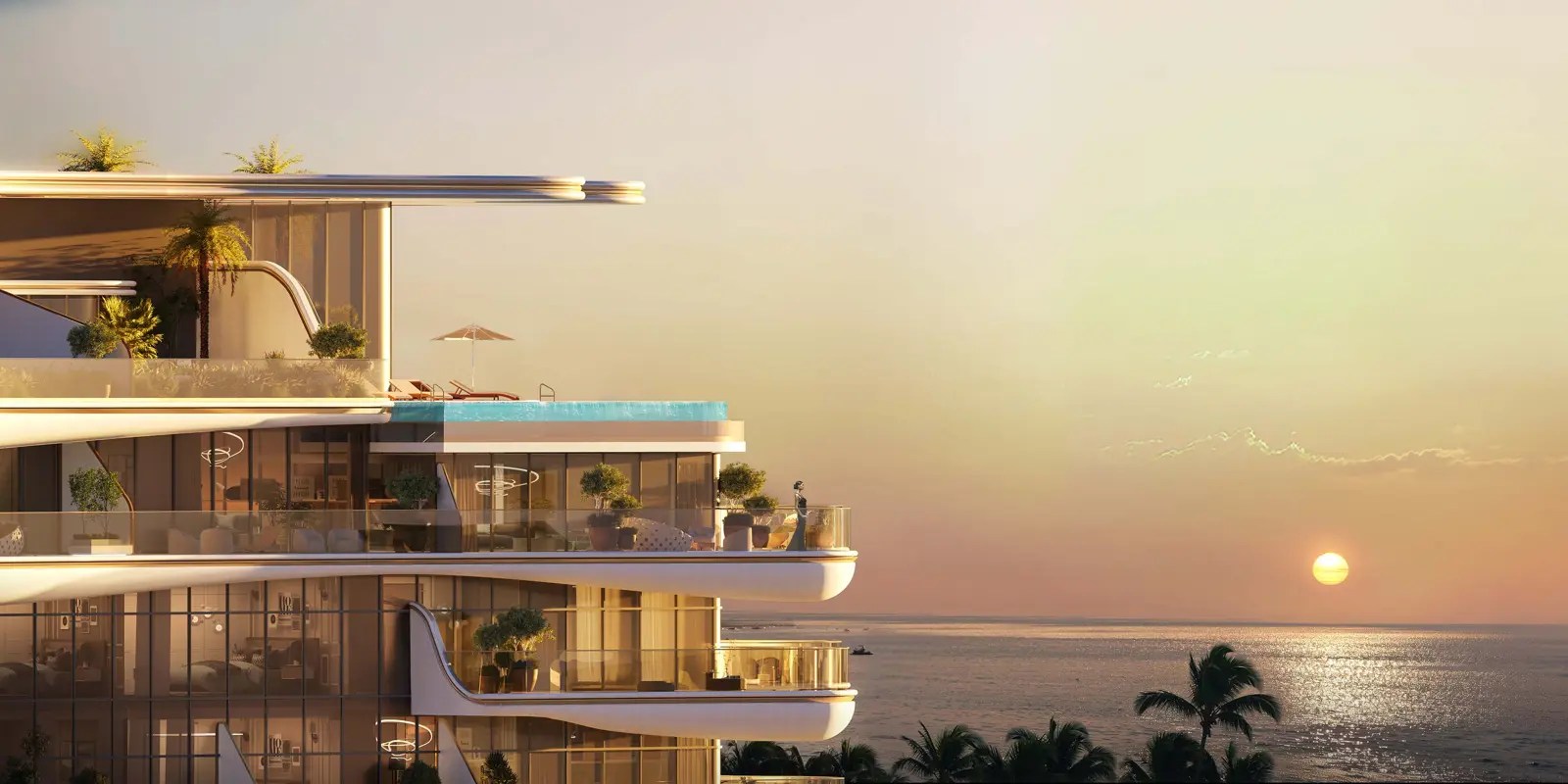 Upper floors and rooftop pool at sunset
