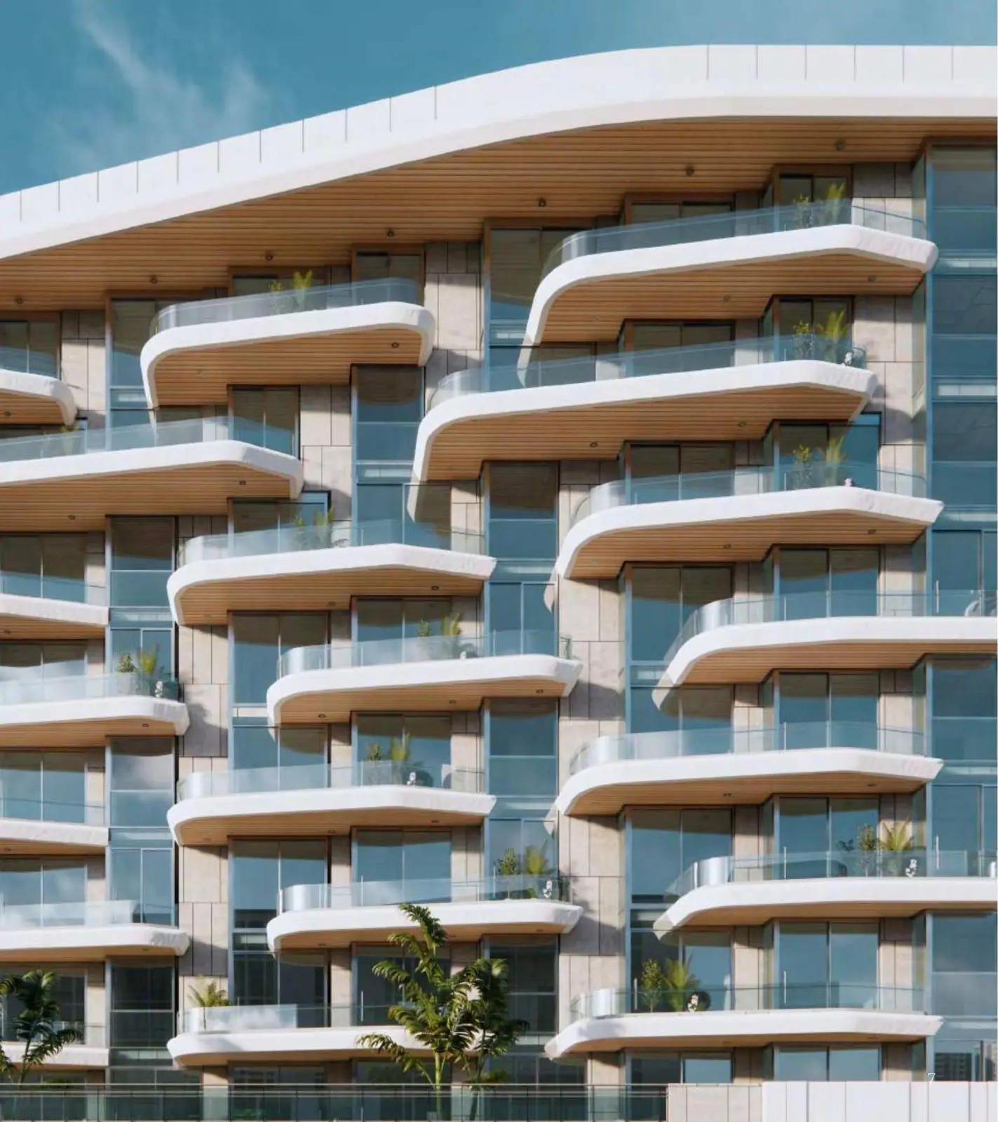 Close view of curved white balconies on the facade
