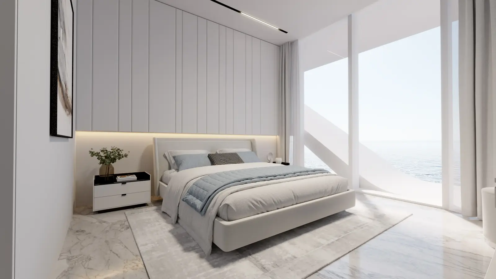 Bedroom with sea view through floor-to-ceiling glass