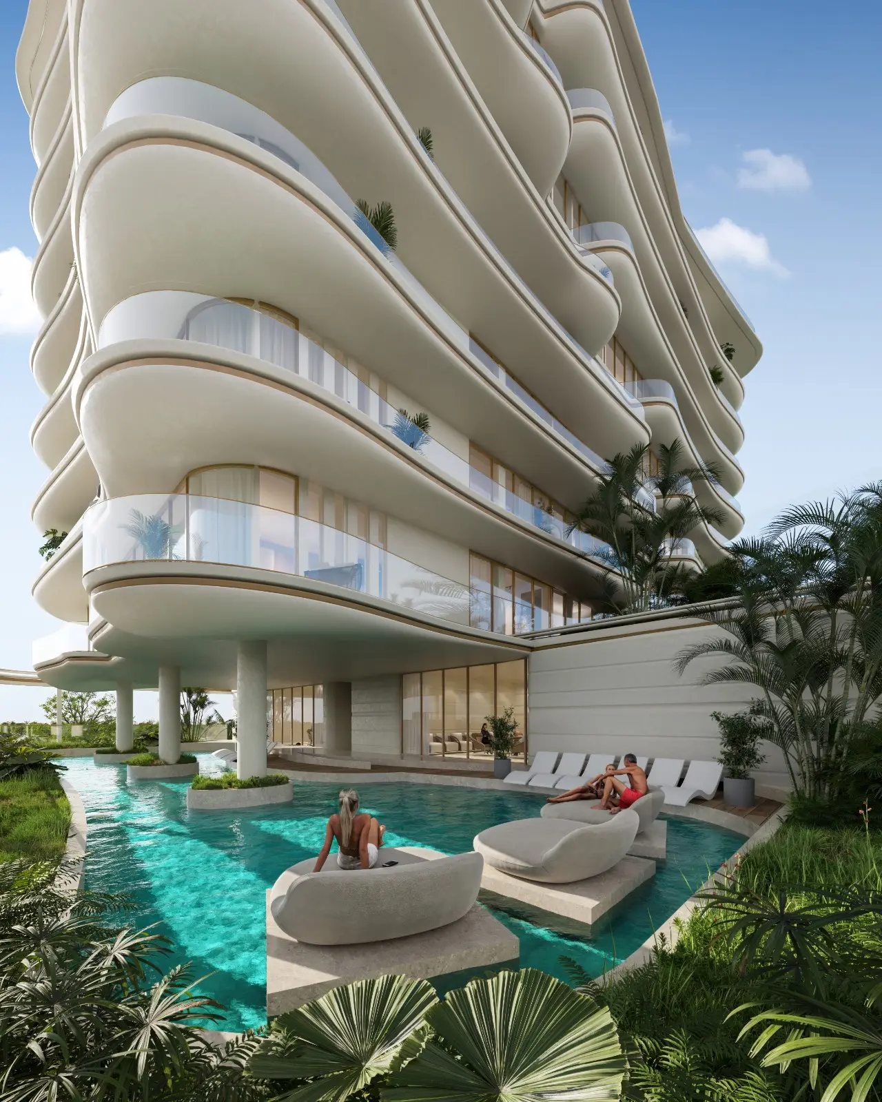Curved tower above the lagoon pool with loungers
