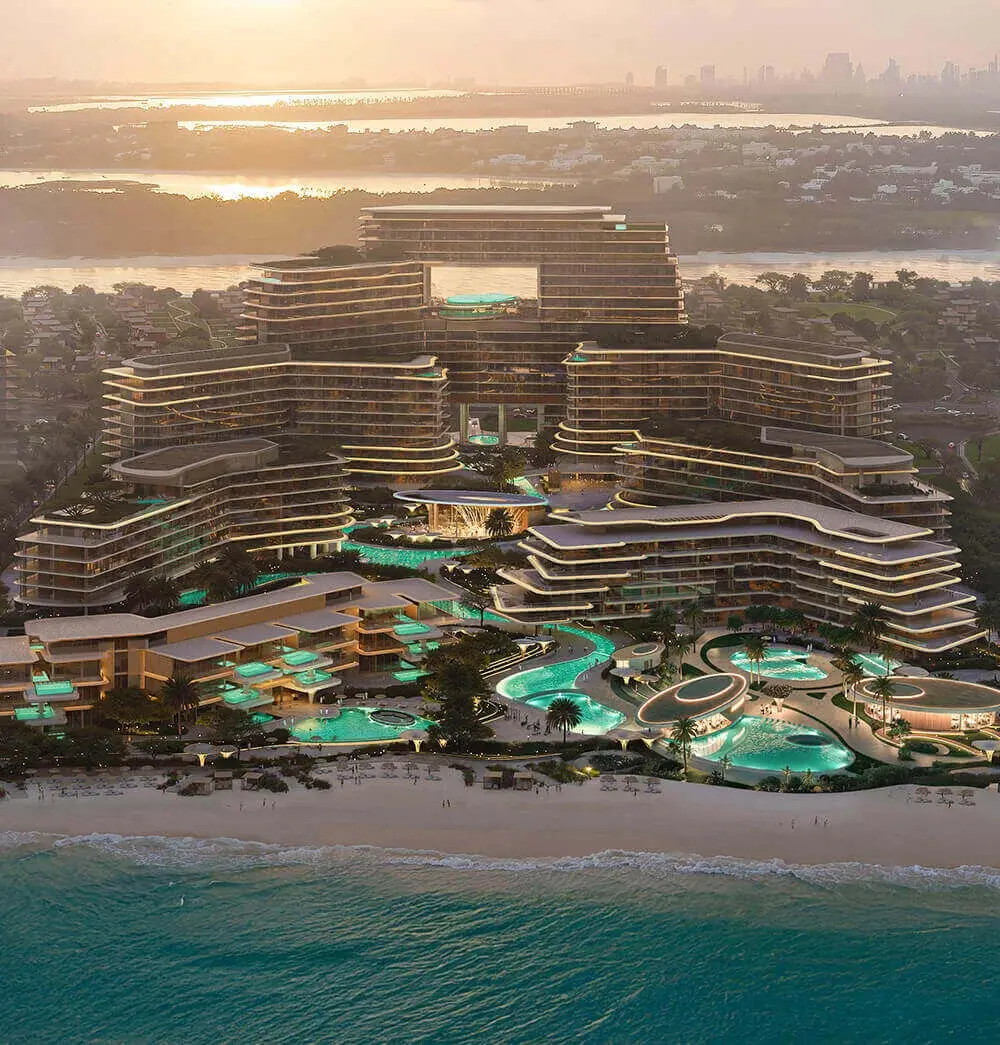 Aerial view of the whole beachfront complex at sunset