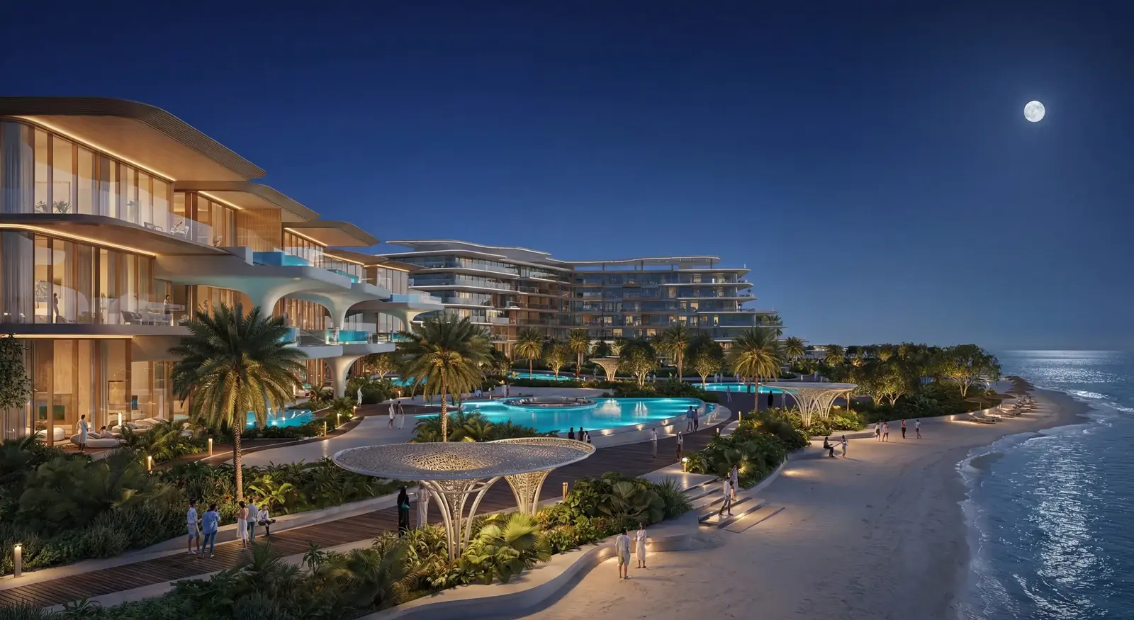 Beachfront promenade and pools at night