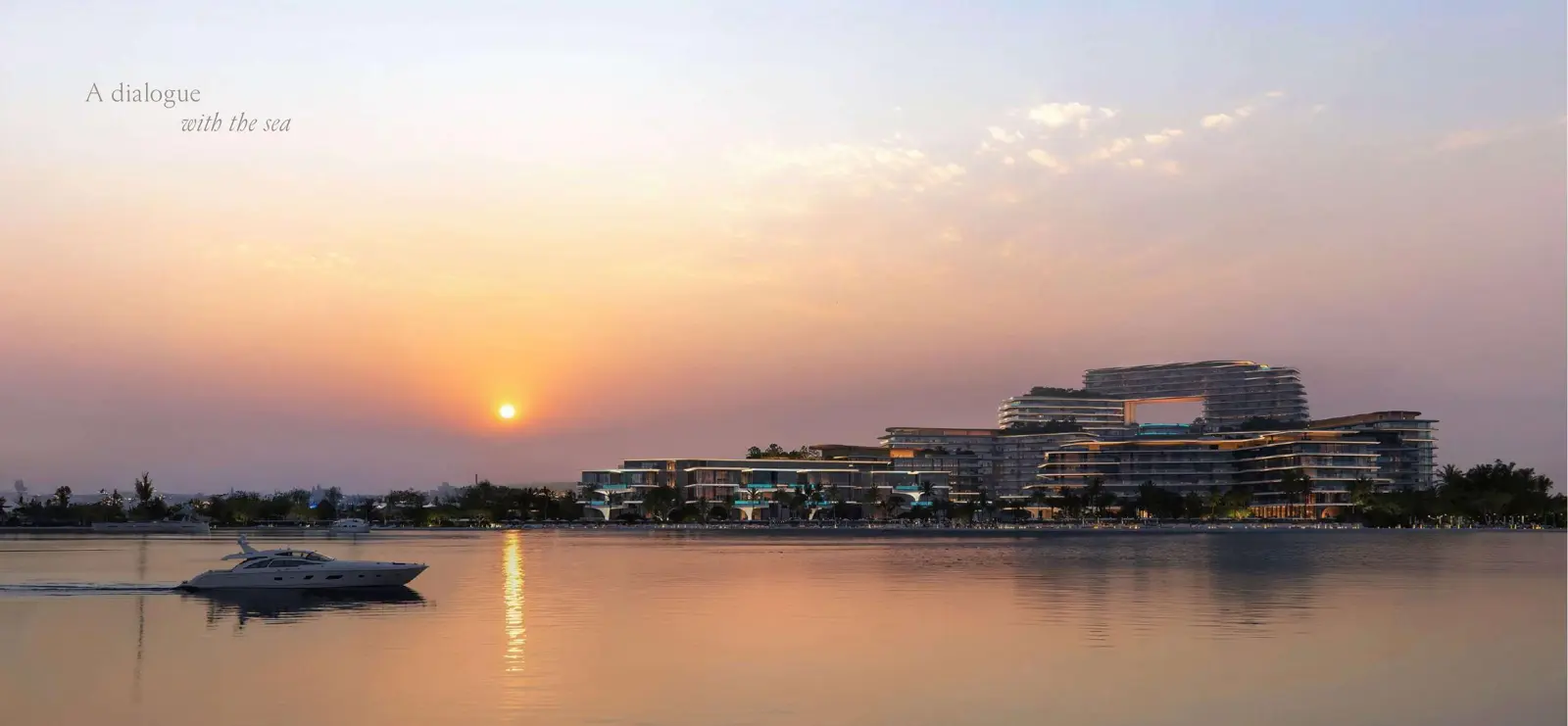 Waterfront view of the project at sunset