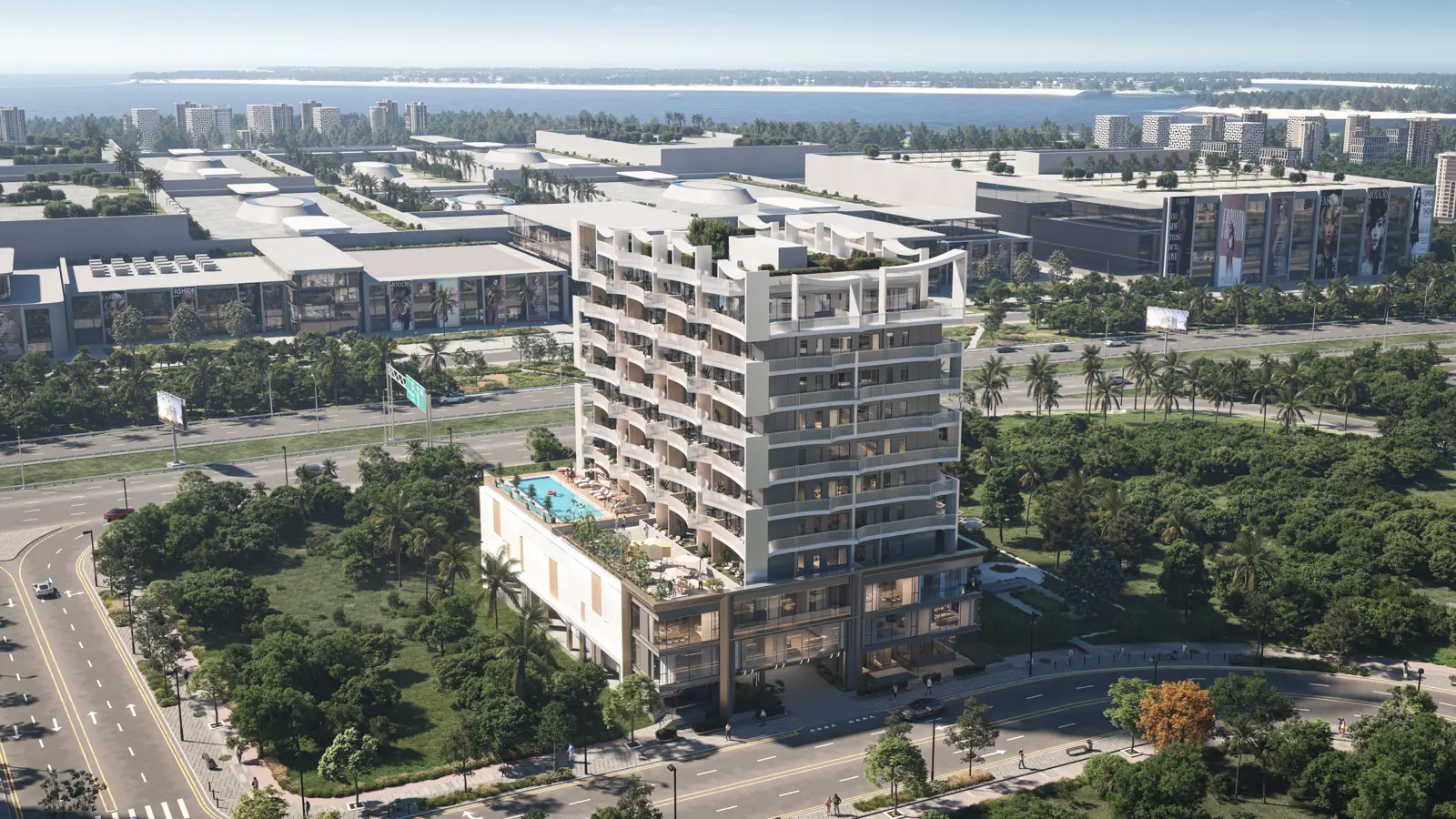 Aerial view of tower with pool deck beside Dubai Islands Mall
