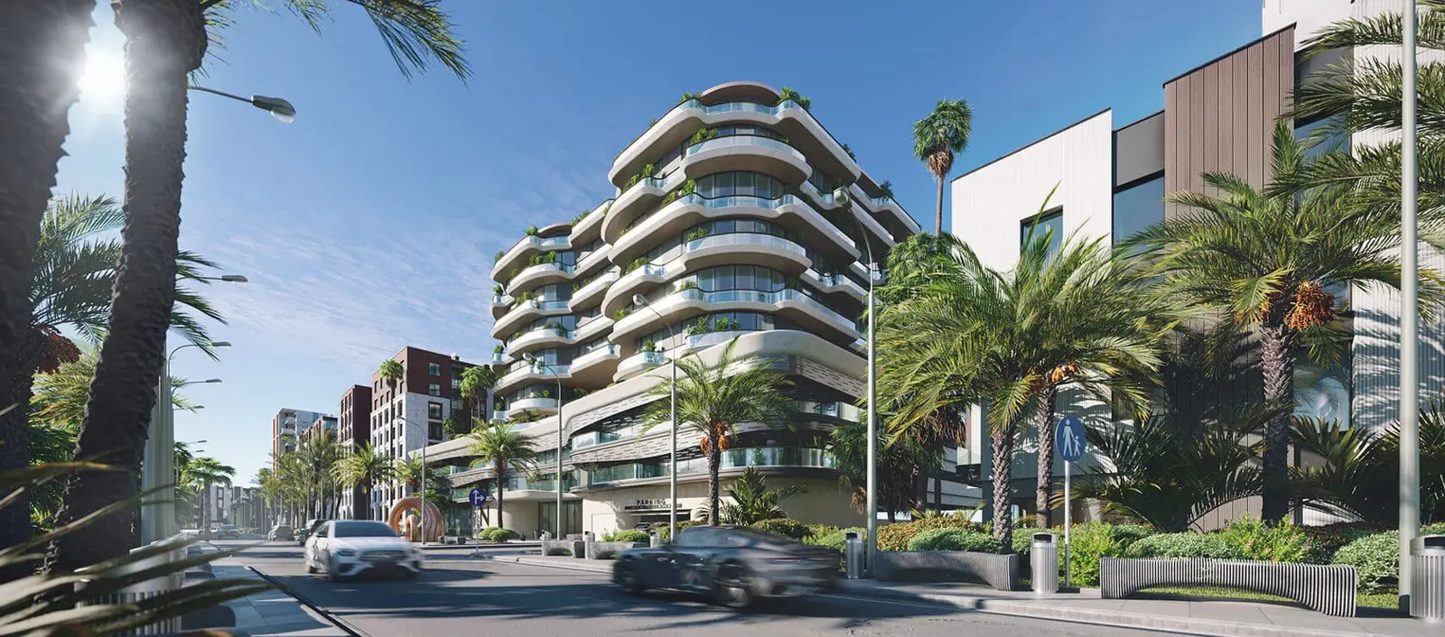 Terraced building seen from a palm-lined street