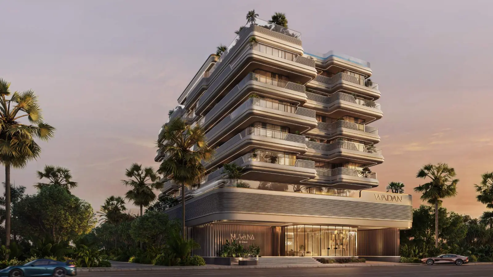 Street view of the building entrance and curved balconies