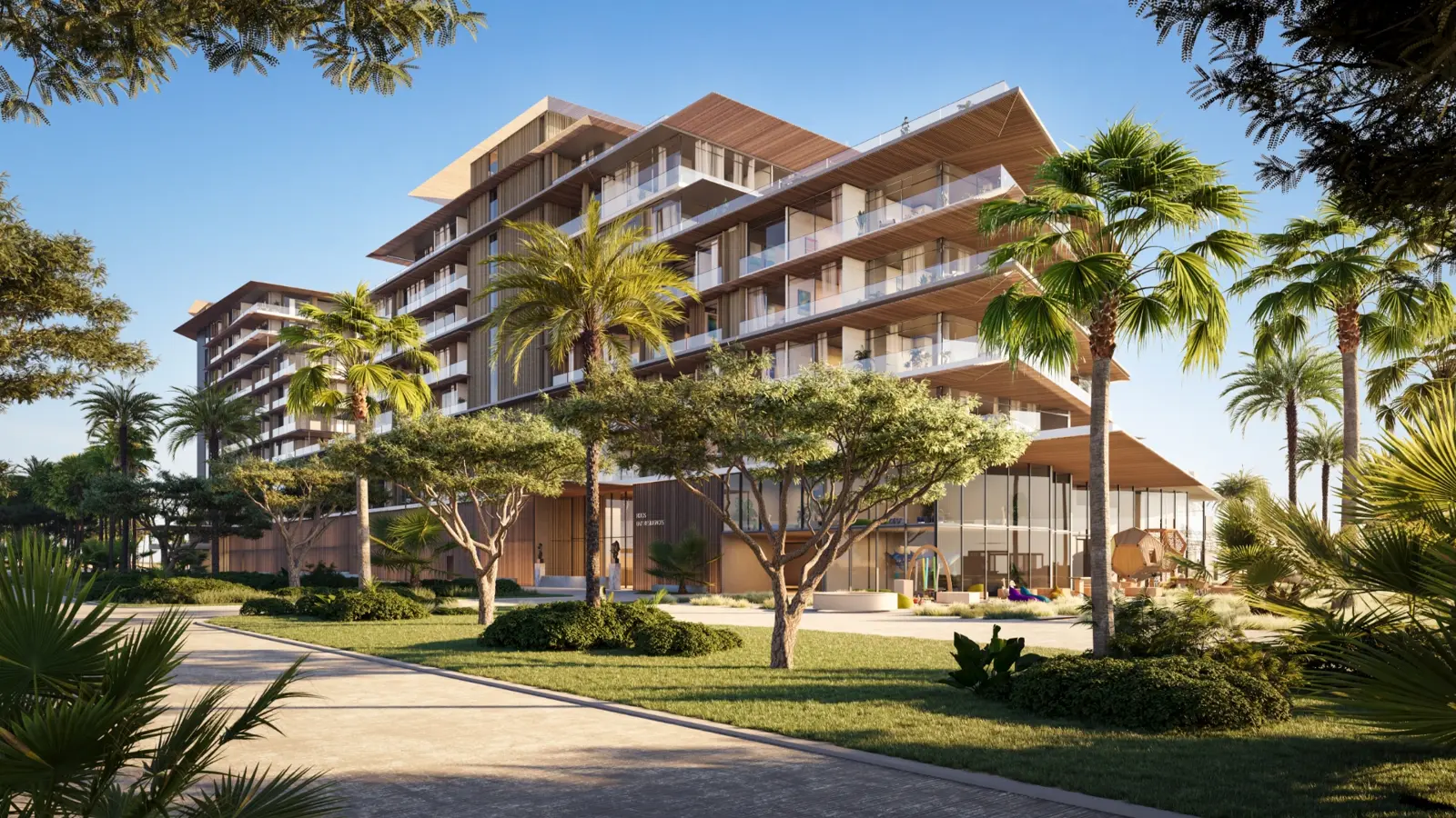 Terraced residential building among palm trees