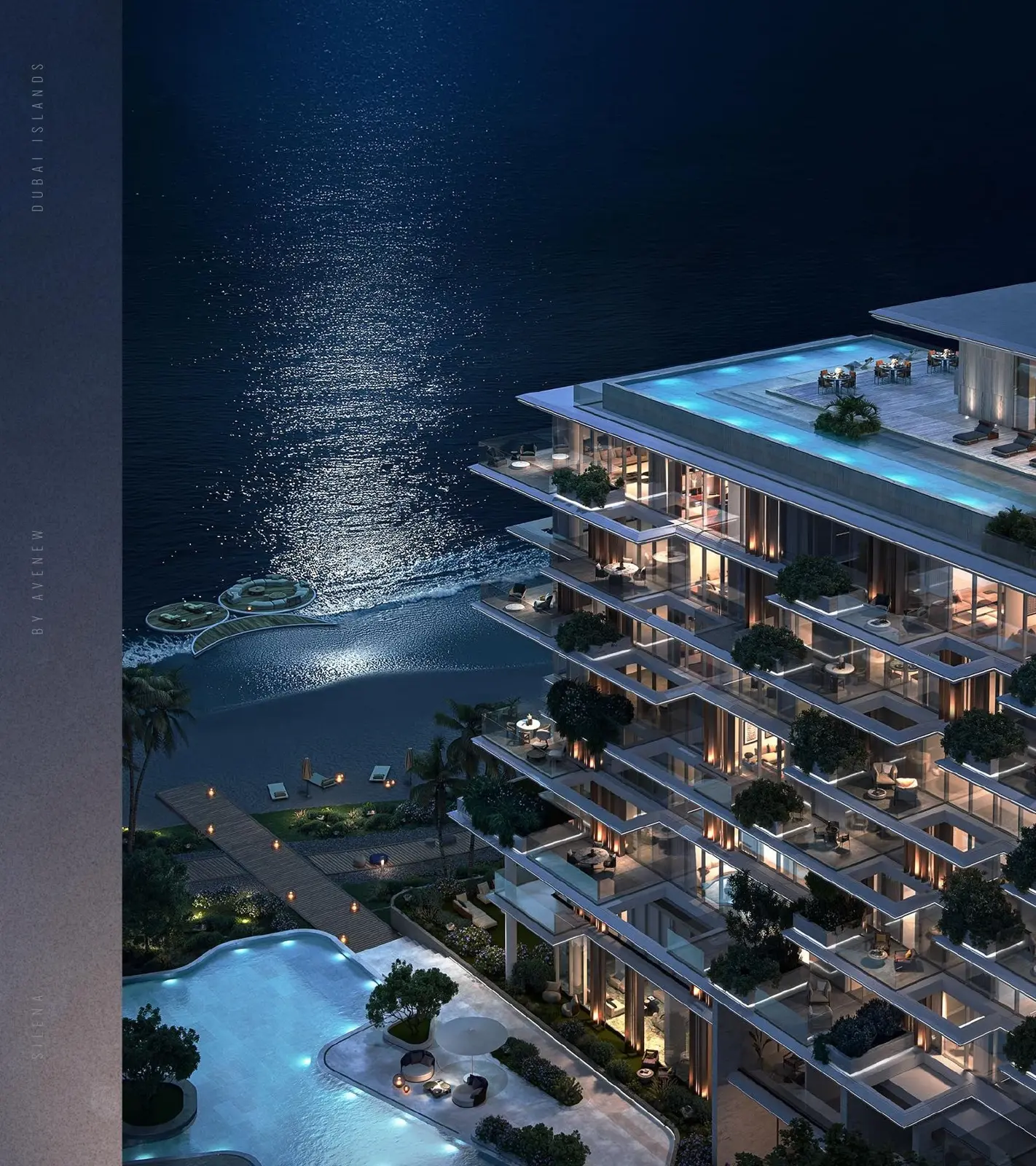 Aerial night view of tower with rooftop pool